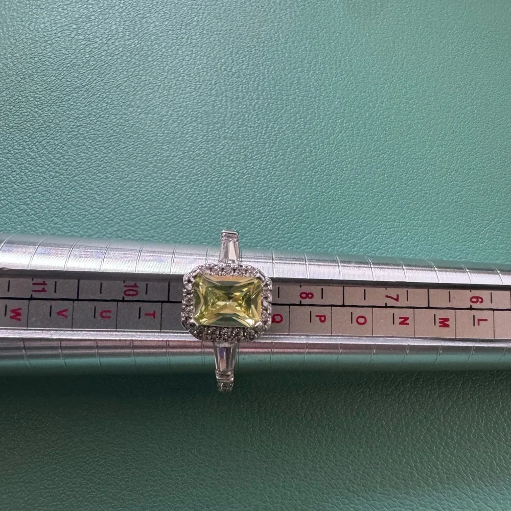 Fragrant jewels Yellow and Silver ring. NWOT. Size 9